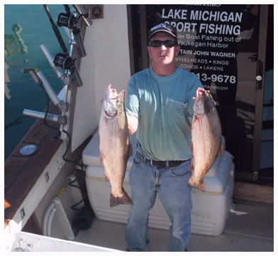 Captain John Wagner Chicago Fishing Charter holding two fish