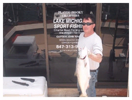 Captain John Wagner Chicago Salmon Charter Boat with one fish 
